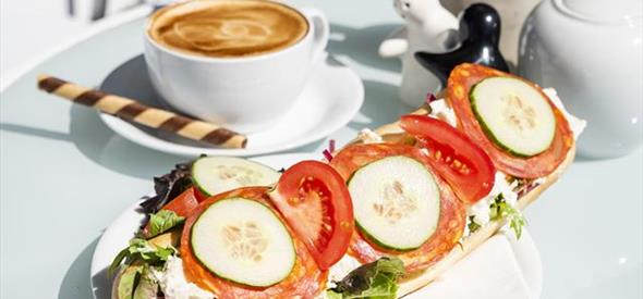 yummy looking coffee and open sandwich.