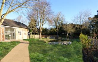Kingfisher Barn Visitor Centre photo on a sunny day