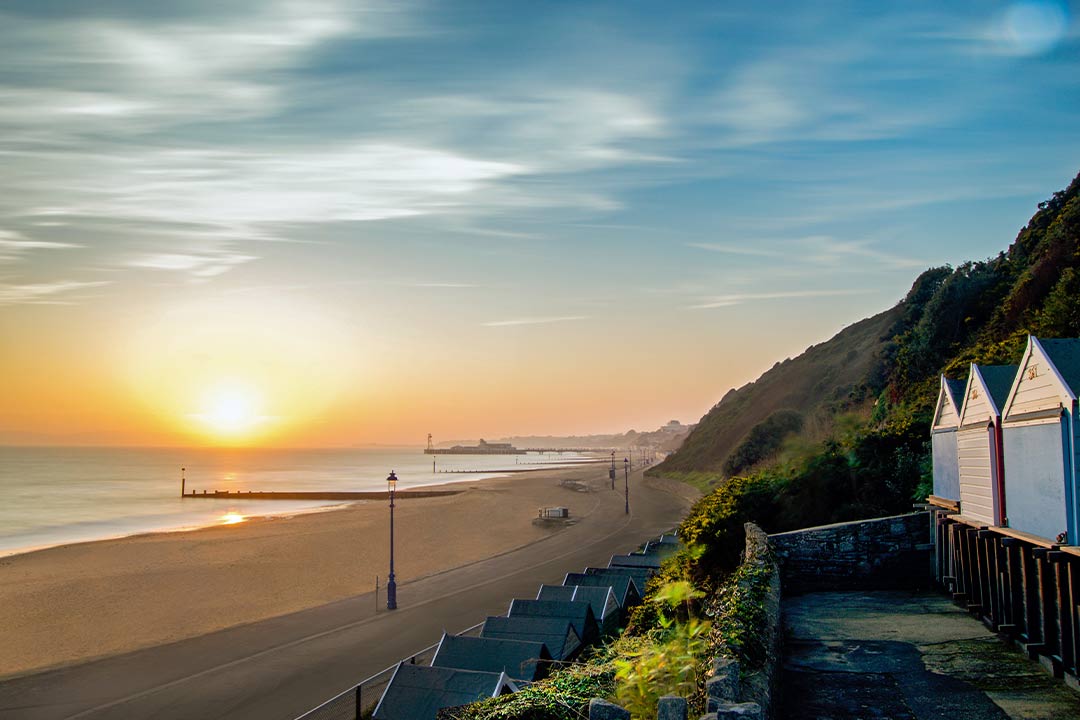 A mixture of blue and yellow colours as the sunsets over Bournemouth beach lodges 