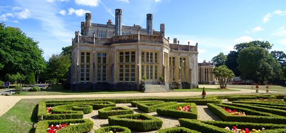 Castle on sunny day with Parterre hedge in the foreground