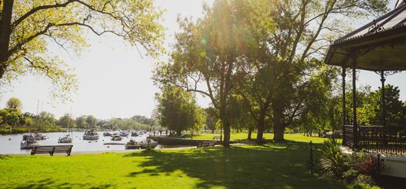 The quay in bright daylight with the bandstand at the side.