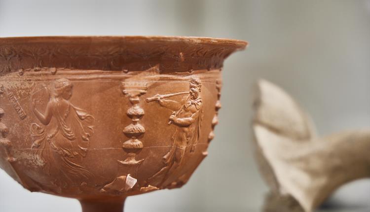 Image of red Roman pot