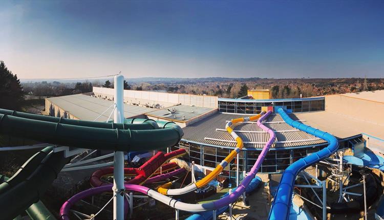 Tubes feeding into splashdown pool from the outside