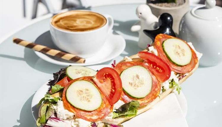 yummy looking coffee and open sandwich.