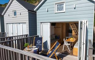 open beach lodge with french doors that allow the air to go through