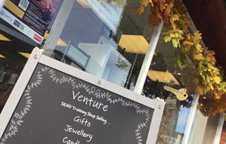 Shop exterior with autumn leaves outside