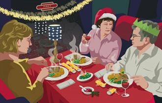 Family sitting around a table with food and Christmas decorations