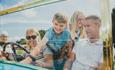 Family in classic car
