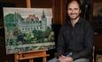 The Enveloping Canopy: An exhibition by Andrew Halliday. Pictured Andrew with other artwork including a castle.