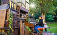 woman playing a beautiful organ in located in Bournemouth's garden for the arts festival