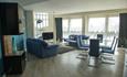 Interior of room with blue furniture.