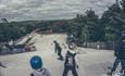 Kids learning hot to snowboard on the big slope