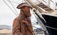Man dressed as Pirate.