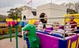 A family enjoying a lovely time on a relaxing Peppa Pig ride.
