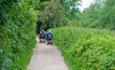 Mobility Scooters going down a country lane