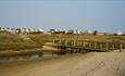 Mudeford Beach huts on the sandspit.