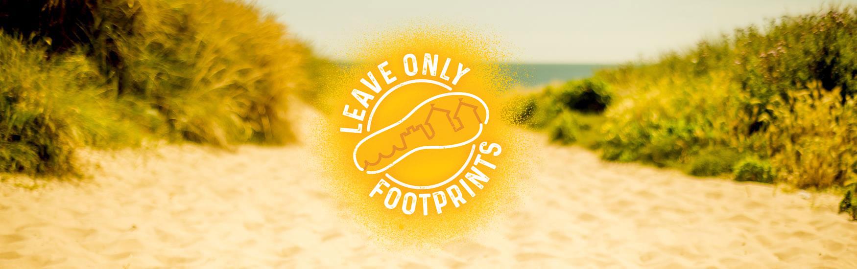 Sunny beach background with Leave only footprints logo in front