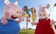 Peppa Pig and her brother pig having fun at Peppa Pig world