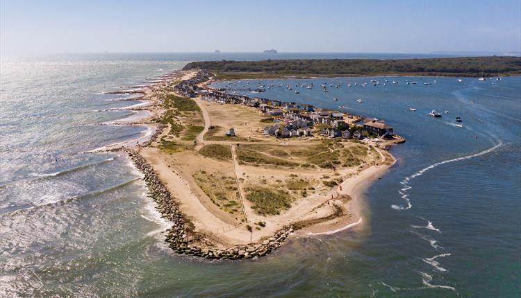 beaches, aerial, birds eye view, shot from above, land, beach, blue sea, blue water, blue sky, boats, beach huts