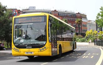 Yellow bus through centre of Bournemouth