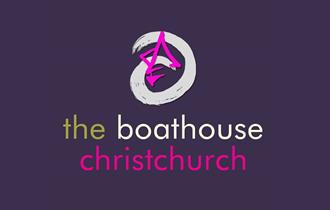 boathouse restaurant logo on purple background.