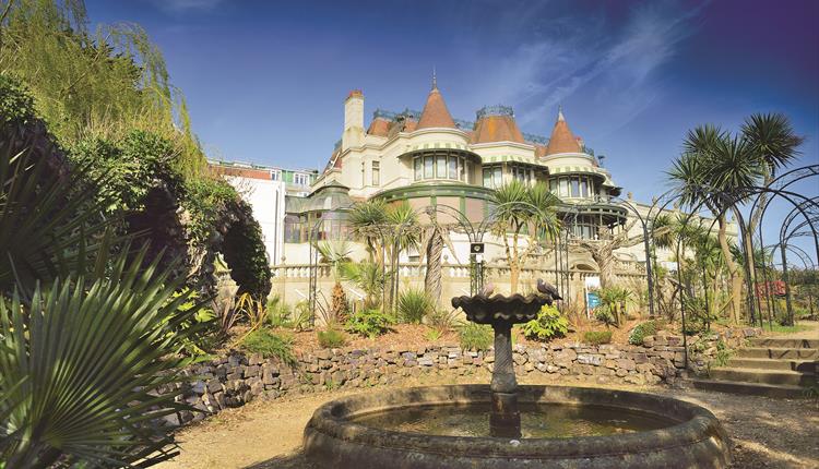 Exterior image of the Russell-Cotes Art Gallery & Museum featuring its tranquil gardens 